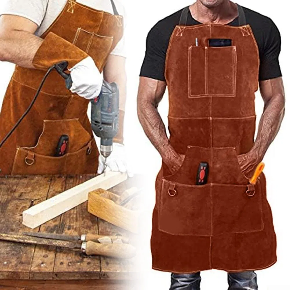 Tablier de soudeur en cuir de vache avec 6 poches pour homme - Résistant à la chaleur - Protection contre les flammes - Pour atelier de forgeron, armurier - Rangement d'outils - Motif croisé dans le