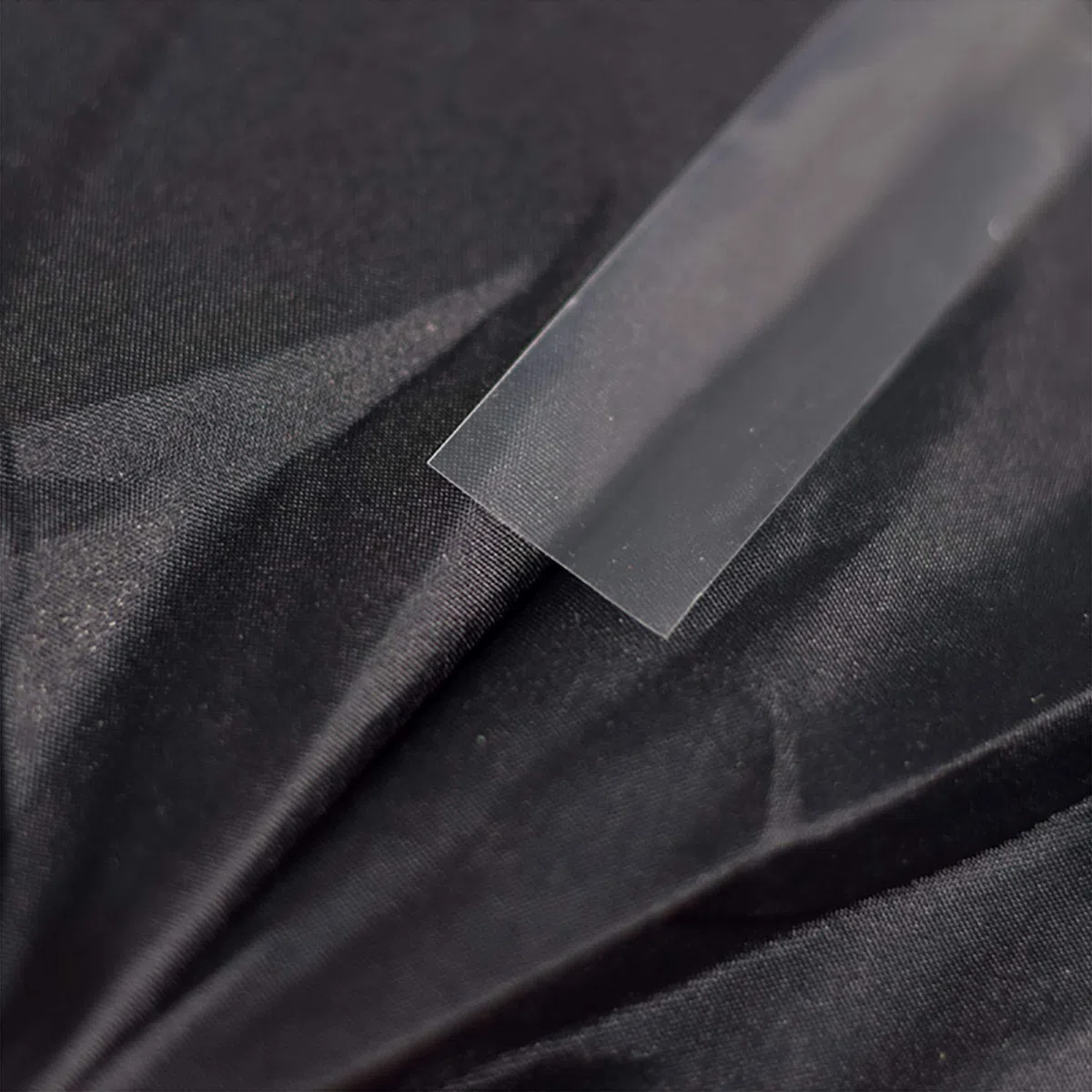Bande d'étanchéité extra forte Épaisseur : 0,20 mm Transparent Seam Sealing Tape : peut être utilisé pour sceller les textiles à forte charge Transmission par colle thermofusible